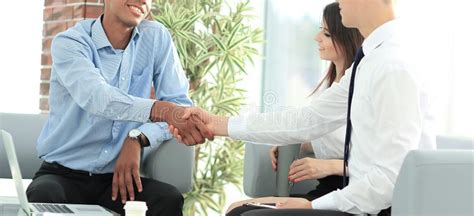 Handshake Manager And Customer In A Modern Office Stock Photo Image