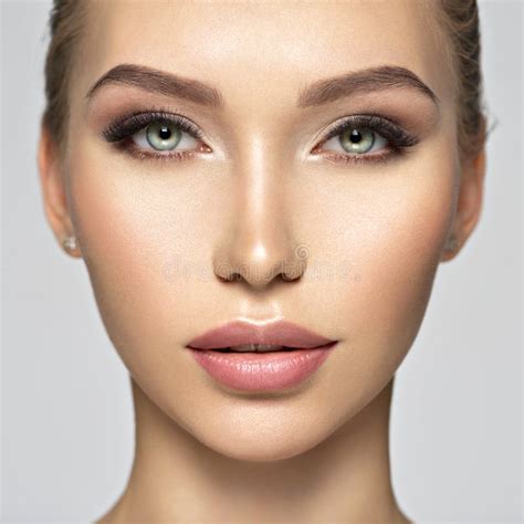 Closeup Face Of Beautiful Young Woman With Healthy Skin Stock Photo