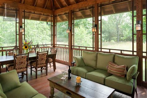 (via victoria mcclure interiors) 7. Screened porch with seating and decor - The Porch Company