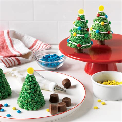 Save these christmas cookie recipes for later by pinning this image. Marshmallow-Krispie Christmas Trees Recipe | MyRecipes