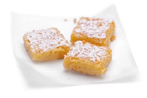 These lemon sugar cookies are thick and chewy and easy to freeze. Delicate Lemon Squares | Christmas-Cookies.com