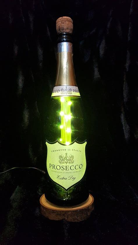 High quality champagne inspired spiral notebooks by independent artists and designers from around the world. Prosecco spiral LED Bottle Light by APDesignCrafts now at ...