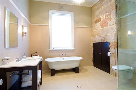 15 Ad Exposed Stone Inside The Renovated Bathroom Adds Old World Charm