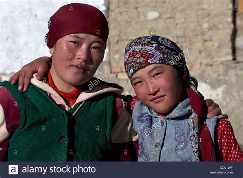 The population density in tajikistan is 68 per km2 (176 people per mi2). Kirghiz people, girl and woman, Pamir, Tajikistan, Central ...