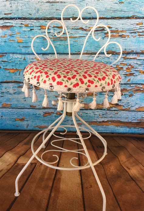 Winter is the perfect time for choosing and implementing a do it yourself (diy) project! Vanity Chair with New Cherries material and white fringe and clear rhinestone studs glamping ...