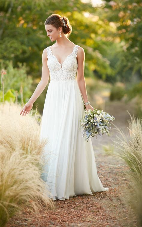 Inspiration and ideas for pretty and modern beach weddings. Beach Boho Chiffon Wedding Gown | Essense of Australia