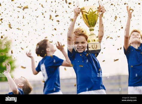 Sport Team Celebrating Success Happy Boys Rising Golden Trophy On