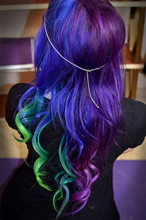If your hair has a lot of pigment in it, you would dye it pink before work your redhead way over to purple. Blue purple dyed hair | Peacock hair color, Galaxy hair ...