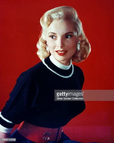 American Actress Janet Leigh In A Navy Short Sleeved Top And Wide