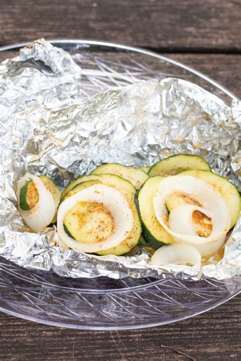 Maybe you would like to learn more about one of these? Campfire Zucchini Foil Packets - This Ole Mom