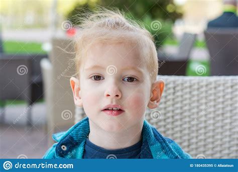 Portrait Of A Cute Little Boy In The Cafe In Spring Stock Image Image