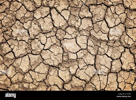 Background Of Dry Cracked Soil Dirt Or Earth During Drought Stock Photo