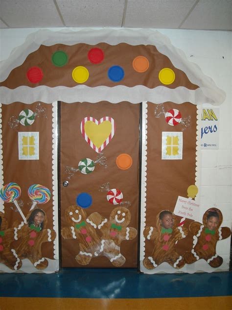 Attach the garland to your. Gingerbread house Christmas classroom door cover. Made with paper, painted paper… | Christmas ...