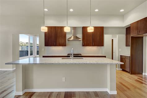 Wash all chiffonier surfaces with a able degreasing cleaner. Spacious kitchen island with deep overhang, providing ...
