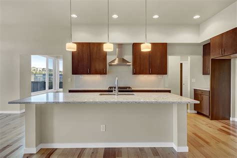 Extra deep kitchen sinks made from stainless steel or porcelain has been on several lists this year. Spacious kitchen island with deep overhang, providing ...