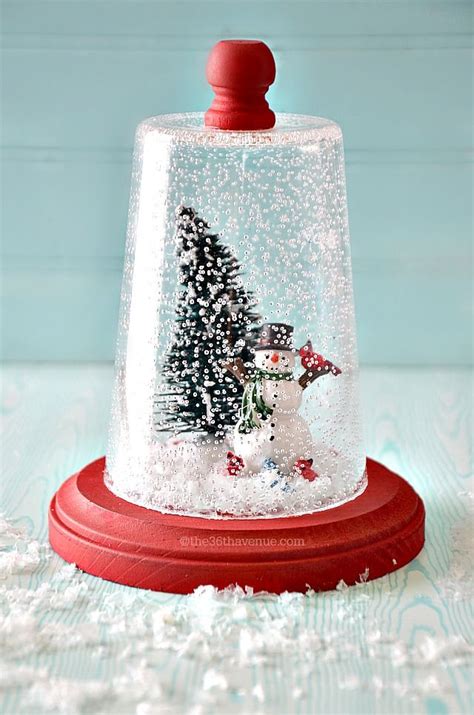 15 Diy Snow Globe Projects The Budget Decorator Christmas Snow