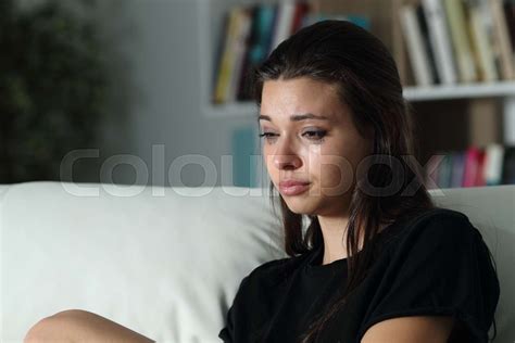 Sad Girl Crying Looking Away Alone At Home Stock Image Colourbox