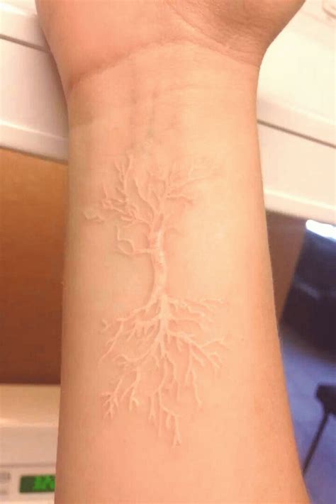 40 Stylish White Ink Tattoos Ideas You Will Love Today Skin Color