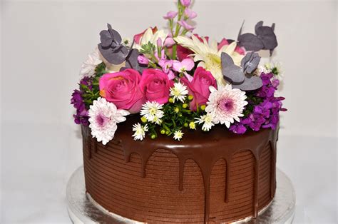Popular flowers starting from 39.99. Mothers' Day Cake. Chocolate cake with fresh flowers (With ...