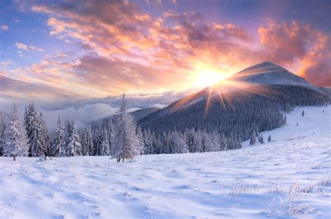 Beautiful Winter Sunrise In The Mountains Stock Photo