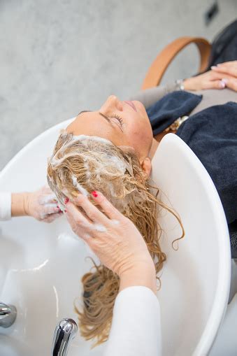 Beautiful Blonde Woman In A Hair Salon Stock Photo Download Image Now