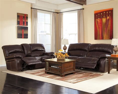 Ashley furniture — not upholding warranty. Damacio Dark Brown Reclining Living Room Set from Ashley ...