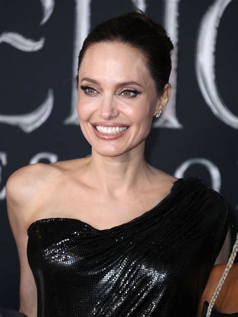 Angelina Jolie Stuns In A Black Dress At Maleficent Mistress Of Evil Premiere In La