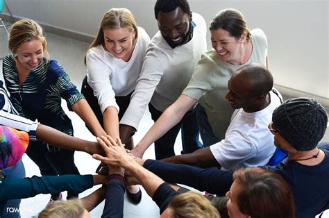 Download Premium Image Of Diversity Teamwork With Joined Hands 9666