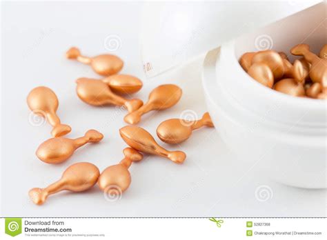 This is specially formulated for curly and dry hair. Hair Vitamin Oil Serum Capsule Beauty Care Isolated On ...