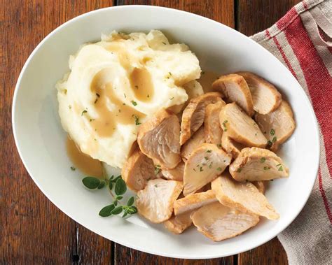 Roasted Turkey And Gravy With Mashed Potatoes Roasted Turkey Slow Roasted Turkey Mashed Potatoes