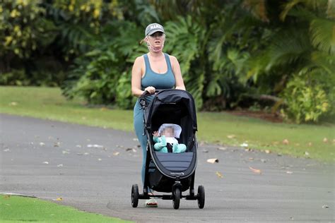 Katy Perry Pushes Daughter Daisy 6 Months As Baby Seen For First Time