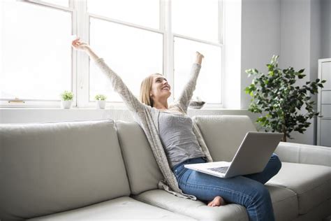Young Woman On A Sofa On The Living Room Stock Image Image Of Couch