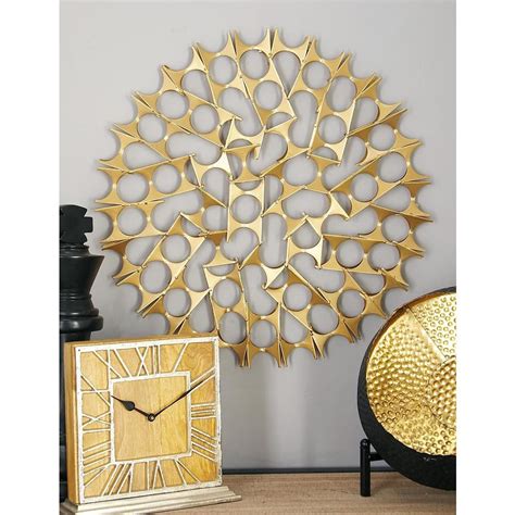 Check spelling or type a new query. Litton Lane Tin Gold Bowties Orb Metal Wall Decor (Set of ...
