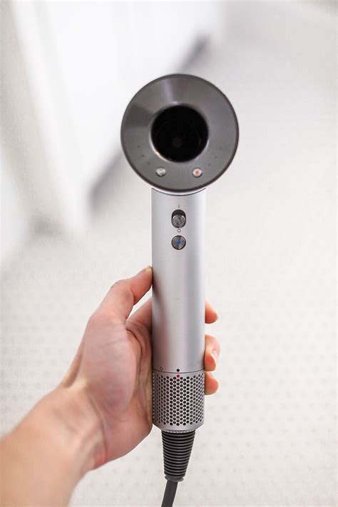 Call dyson singapore toll free at 1800 397 6674. My Honest Review of the Dyson Supersonic Hair Dryer | Natalie Yerger