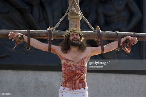 The Final Scenes Of A Suffering Jesus Being Crucified On The Cross At