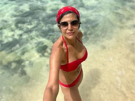 mandira bedi looks bold in red bikini and clicks hot selfie photos viral on internet mandira