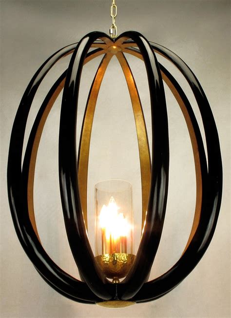 Nordic black & gold chandelier. Tall Black French Polish and Gold Leaf Ovoid Pendant ...
