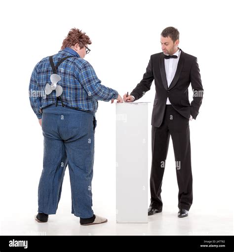 Elegant Man In A Tuxedo And Bow Tie Standing Arguing With An Overweight