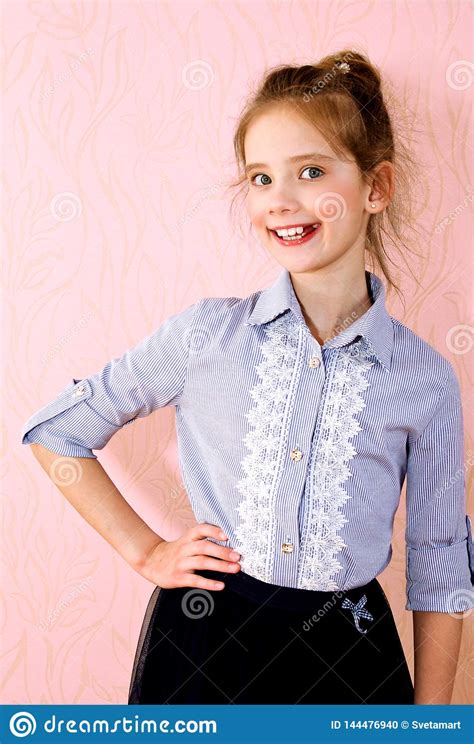 Portrait Of Adorable Smiling Little Girl Schoolgirl Child Stock Photo - Image of caucasian ...