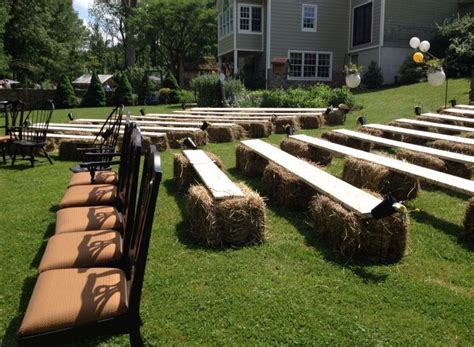 Hay Bale And Covered Plank Seating Hay Bale Wedding Wedding Ceremony