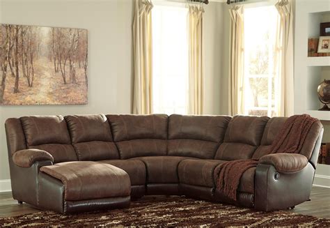 Match your unique style to your budget with a brand new ashley® sectional sofas to transform the look of your room. Signature Design by Ashley Nantahala Faux Leather ...
