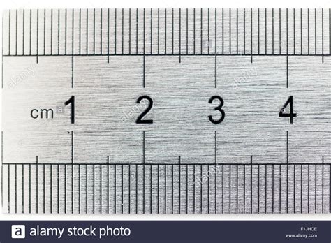 How much are 10.4 feet in centimeters? Rulers. Brushed steel ruler showing 1-4 cm range and ...