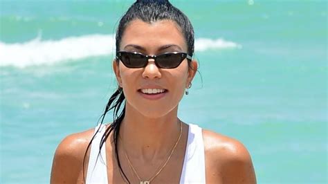kourtney kardashian flaunts body in slinky high cut swimsuit on miami beach adelaide now