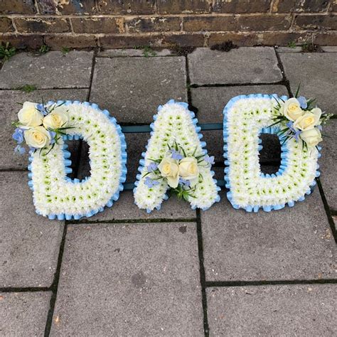 Pale Baby Blue And White Dad Letters Funeral Flowers Tribute Wreath In
