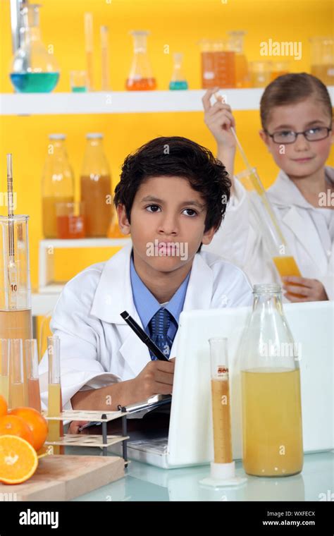 Kids Performing Science Experiment Stock Photo Alamy