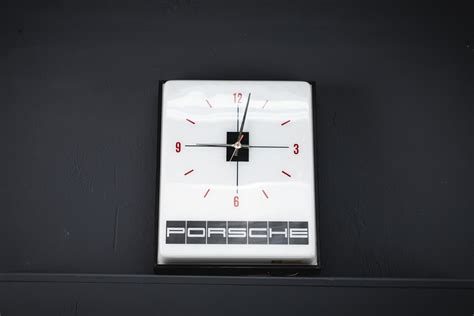 A Retro Original 1970s Vintage Illuminated Porsche Wall Clock