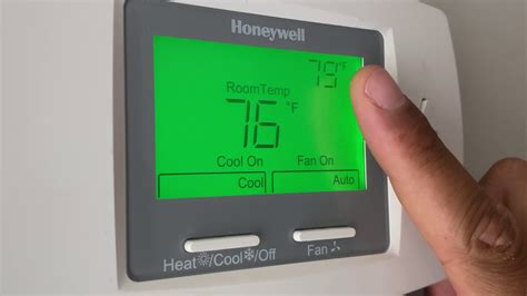 Open the battery door towards the back and remove the batteries. Honeywell Thermostat - How To Operate - YouTube