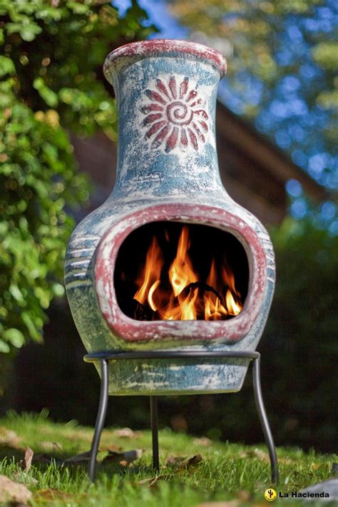 A chimney fire is the combustion (burning) of residue deposits referred to as soot or creosote, on the inner surfaces of chimney tiles, flue liners, stove pipes, etc. Mexican Clay Chimenea Swirl Chiminea Patio Heater Fire ...