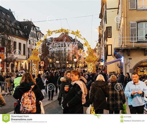 Entrance Gate To Christmas Market With People Taking