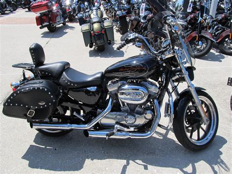 The ™ superlow easy to own and fun to ride. Pre-Owned 2011 Harley-Davidson Sportster 883 Superlow ...